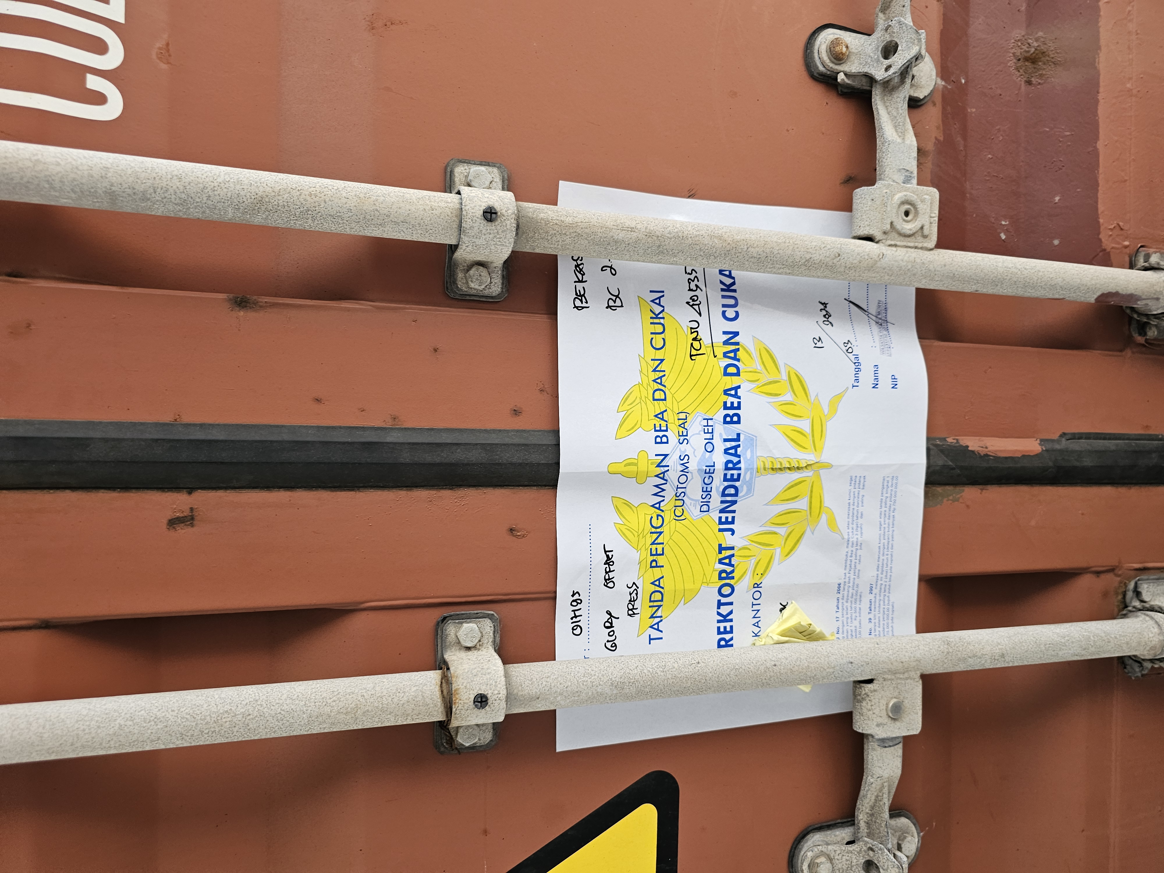 Official customs seal (Tanda Pengaman Bea dan Cukai) from Indonesia's Directorate General of Customs and Excise applied to a sealed PT Glory Offset Press export container