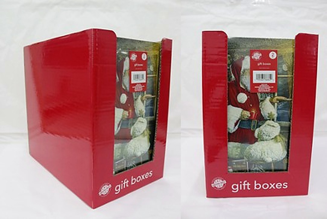 Red gift boxes displayed in a PDQ shelf-ready retail tray